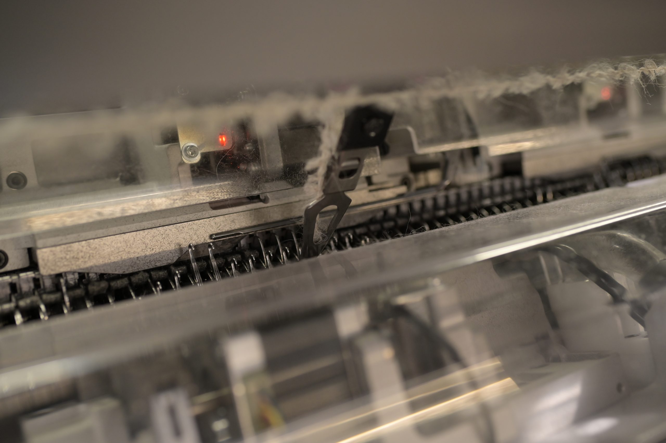 Sewing thread needles details closeup